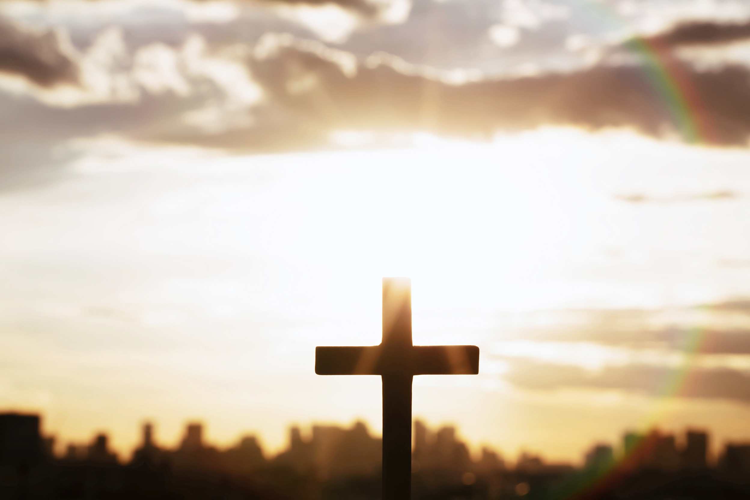 Silhouette of a Cross at Sunset